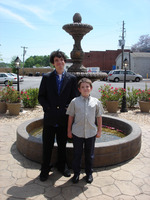 youthful Lawrencevillagers in front of inoperative fountain