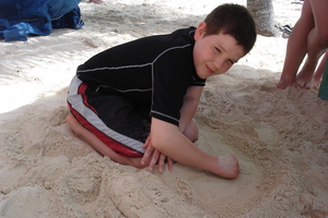 Paul playing in sand